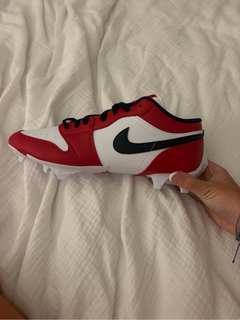 Jordan Red, White and Black Athletic Cleats in men’s size 11